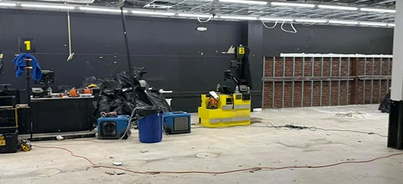 Construction site with equipment, flyer for Ann Arbor commercial water cleanup.
